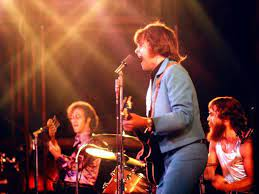 Creedence in concert. Stu Cook on Bass, John Fogerty guitar and vocals, and Doug Clifford drums