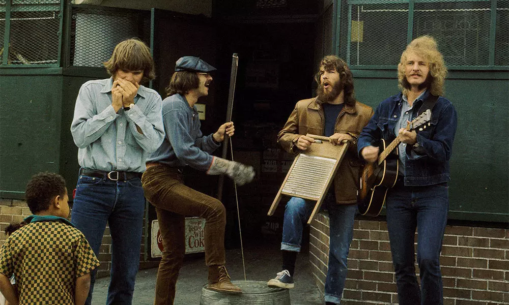 Creedence Clearwater Revival, doing what they do best, playing music. Photo shoot foe 