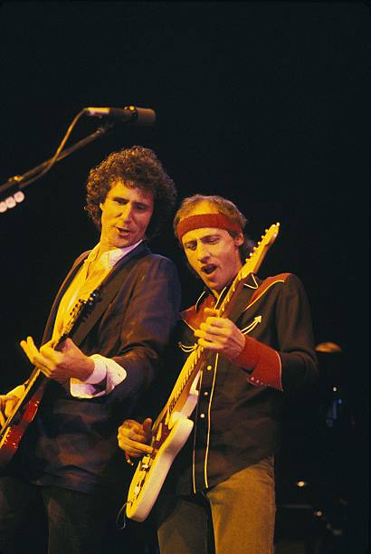 The two longest serving members of Dire Straits, John Illsey and Mark Knopfler.