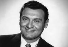 Frankie Laine, the neat 1950's American singer with many hits before the Beatles took over.