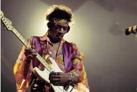Jimi Hendrix in typical stance, live in the UK.