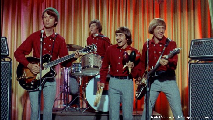 The Monkees, miming "Last Train to Clarksville" on their popular TV show.