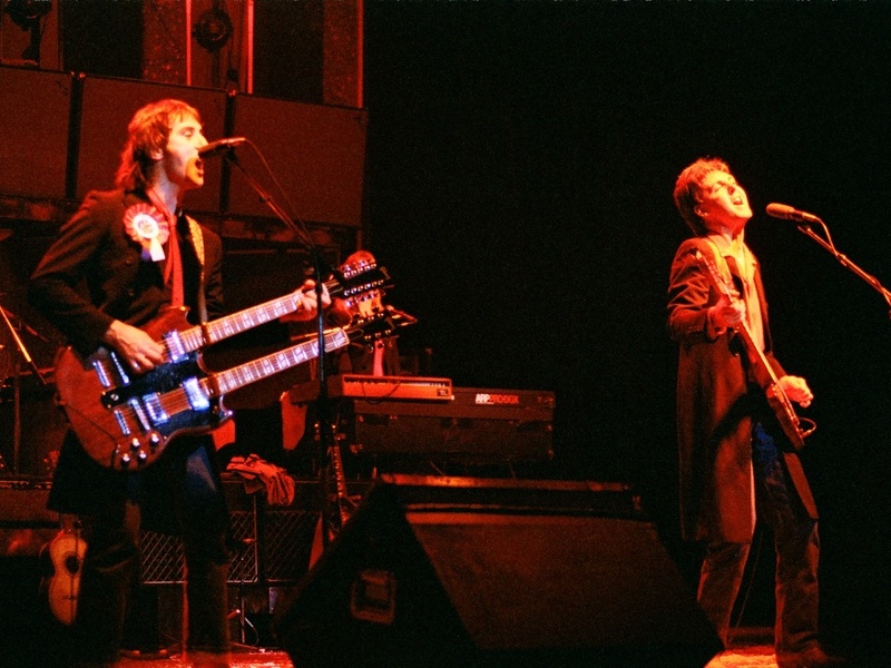 Paul McCartney with Denny Laine, live during their 1975 tour.