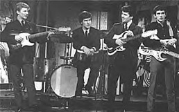 The Searchers take a break during a TV performance. New member Frank Allen, far right.