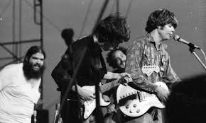 Bob Hite watches Al Wilson and the rest of Canned heat in a live performance.